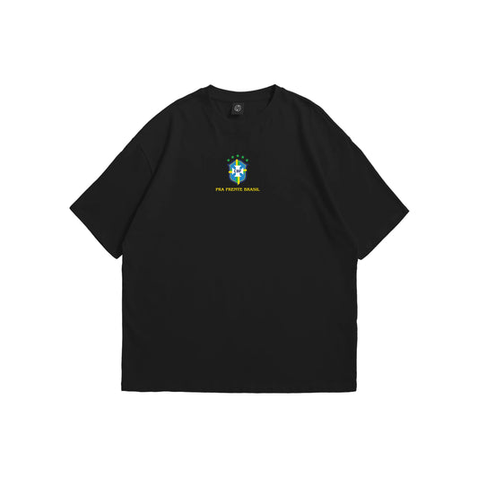 A black oversized t-shirt shown from the front and back, featuring the Brazil CBF crest on the chest and a large intricate yellow line-art illustration of Brazilian landmarks and five stars on the reverse - sports streetwear apparel by Stick-On Limited.