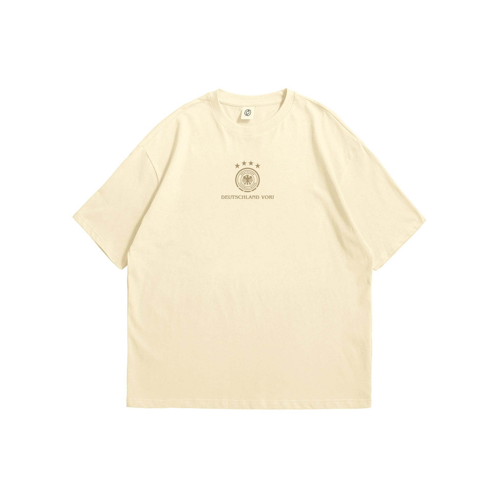 A cream oversized t-shirt shown from the front and back, featuring a small brown Germany DFB crest on the chest and a large intricate circular line-art illustration of German landmarks and four stars on the reverse - sports streetwear apparel by Stick-On Limited