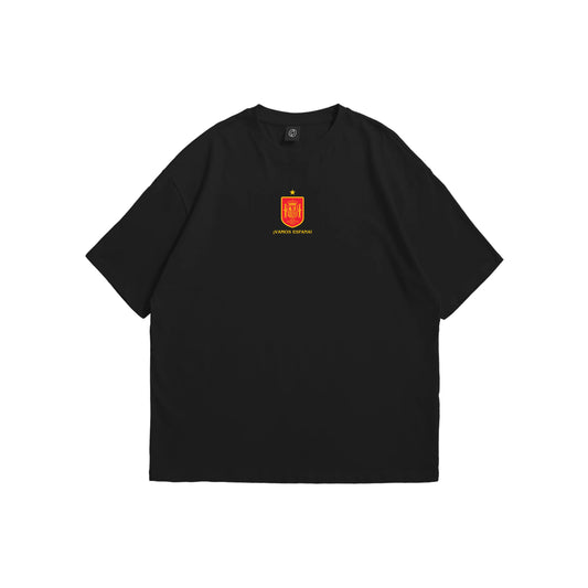 A black oversized t-shirt shown from the front and back, featuring a small red and gold Spain RFEF crest on the chest and a large intricate red line-art illustration of Spanish landmarks and a crown on the reverse - sports streetwear apparel by Stick-On Limited.