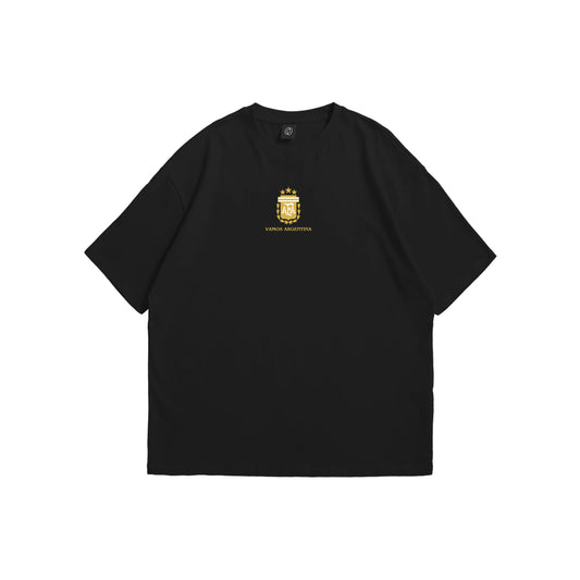 A black oversized t-shirt shown from the front and back, featuring a gold Argentina AFA crest on the chest and a large intricate blue line-art illustration of Buenos Aires landmarks and three stars on the reverse - sports streetwear apparel by Stick-On Limited.