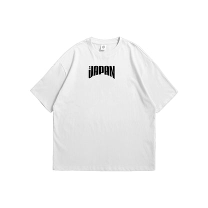 Front and back view of a white t-shirt featuring a minimalist black Japan logo on the front chest and a bold orange Seigaiha wave graphic on the back - streetwear apparel by Stick-On Limited.